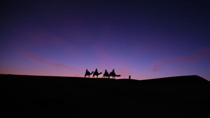 Embark on an Enchanting Camel Ride Through the Merzouga Desert